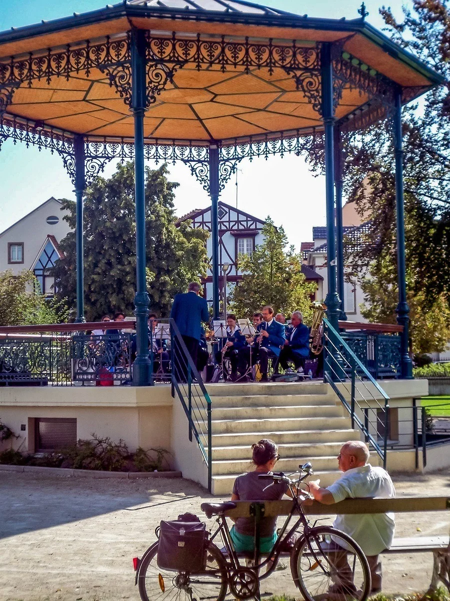 A band playing music in the band stand in Colmar, France
