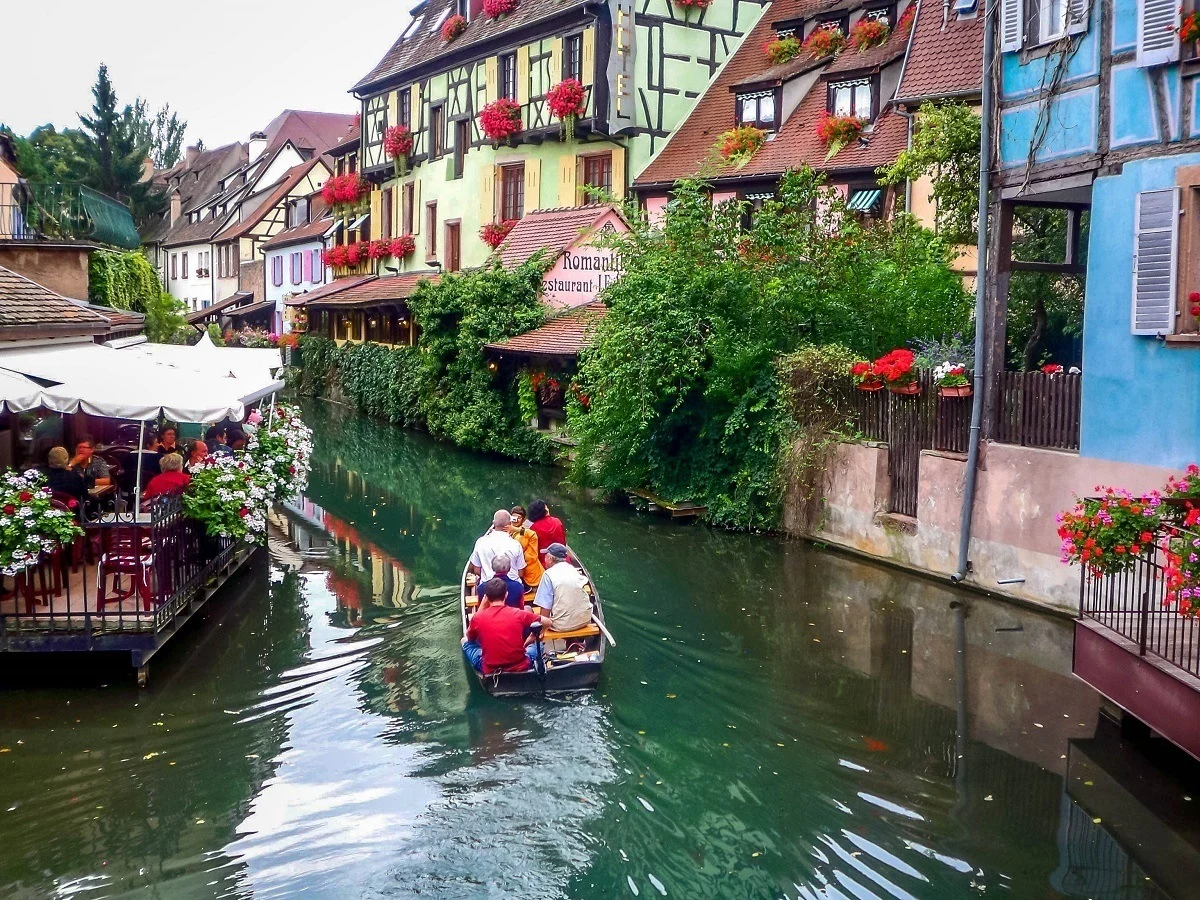 People taking a boat ride in the canal in Colmar