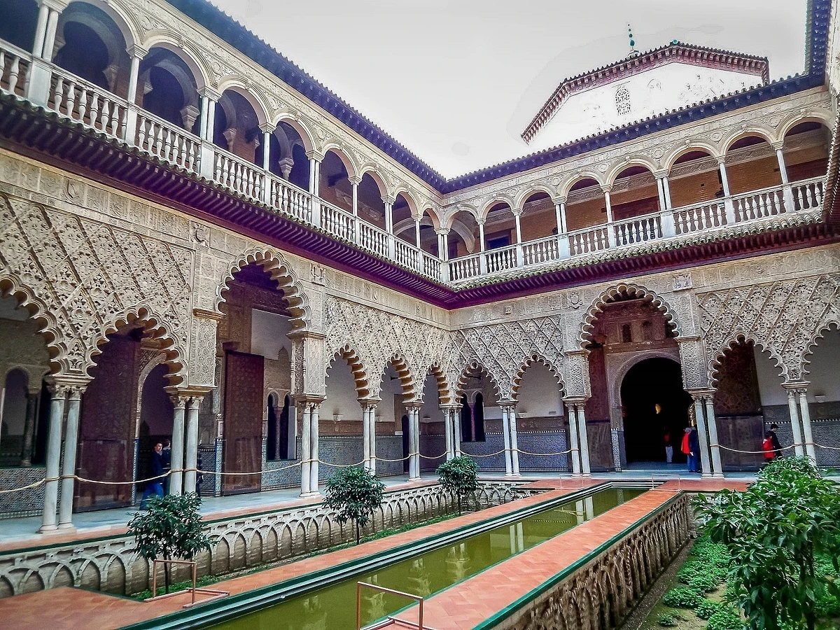 The courtyard of the Seville Alcazar palace in Spain