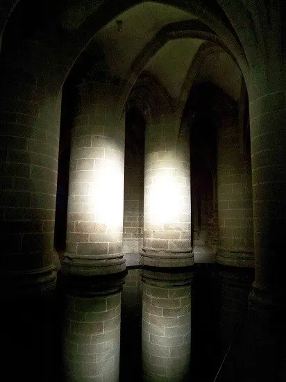 Columns inside the Abbey, which is illuminated at night