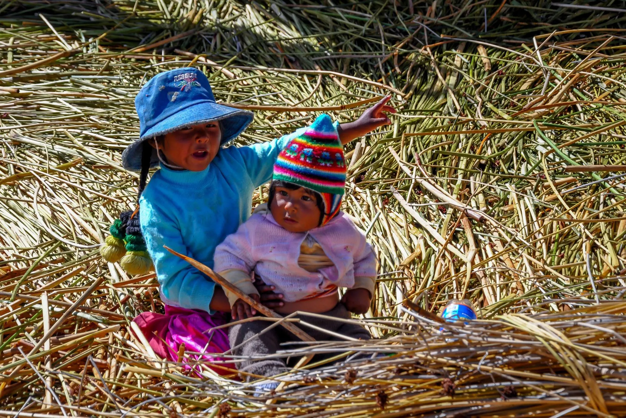 Two young children playing in Peru