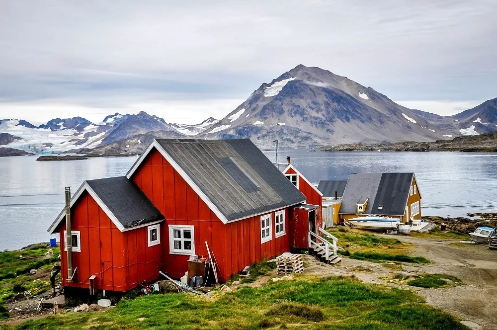 Bright red house near the ocean in Greenland
