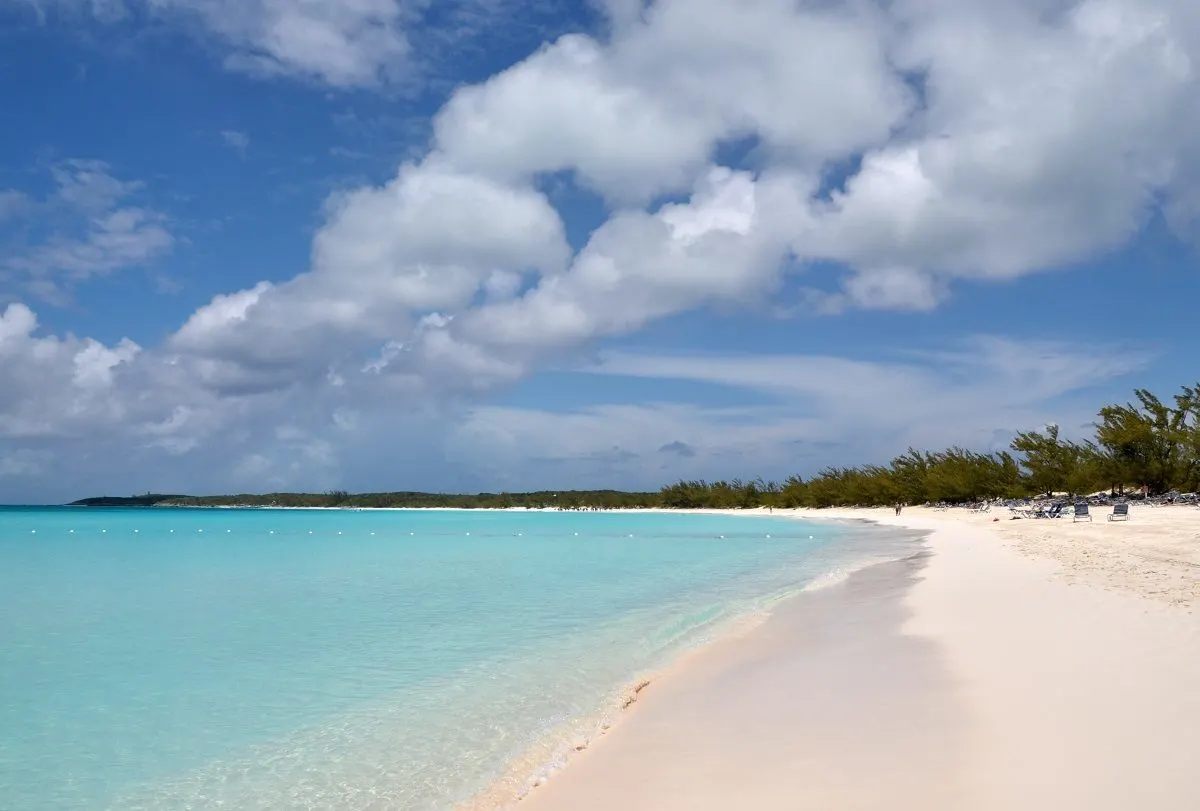 The white sand and blue water on the beach