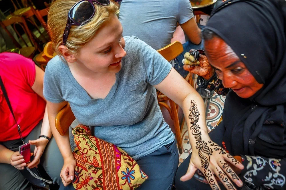 Getting a henna tattoo in Khan al-Khalili