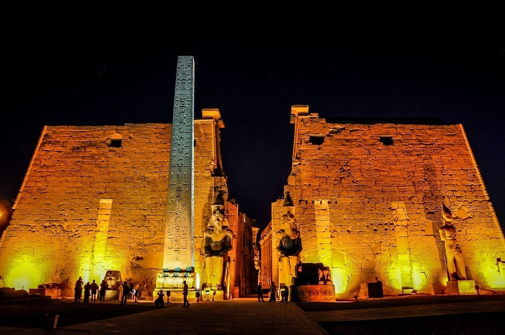 Luxor Temple and obelisk lit up at night