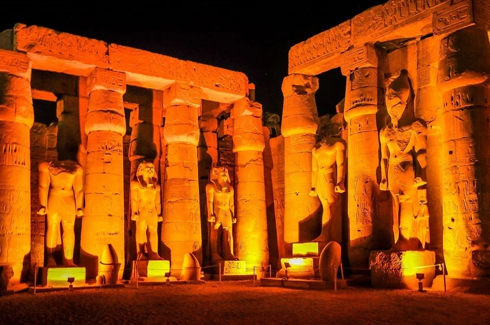 Pharaoh statues at the Temple of Luxor at night