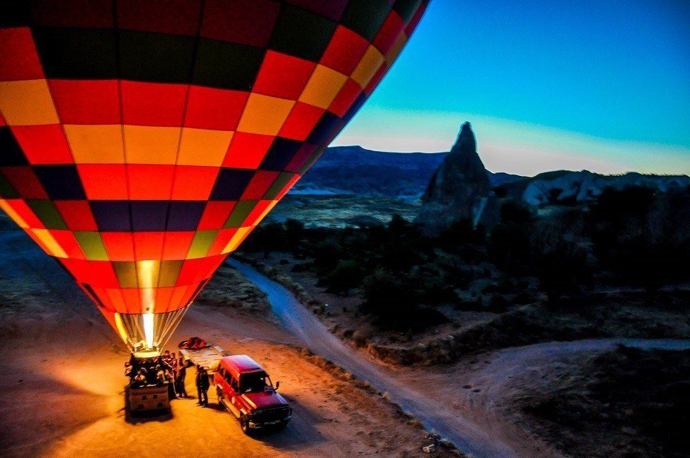 A burner inflating one of the hot air balloons in Cappadocia in the early morning hours