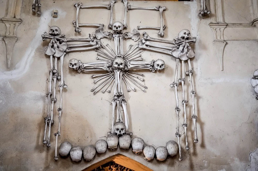 Cross sculpture made of human bones