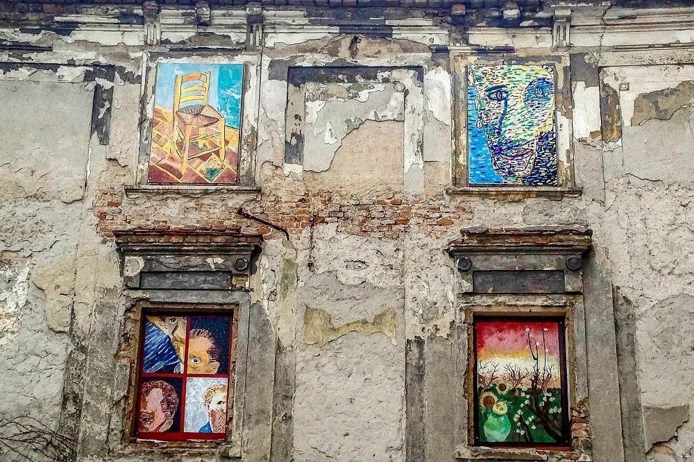 Van Gogh replica paintings on the side of a building while exploring Bratislava in a day