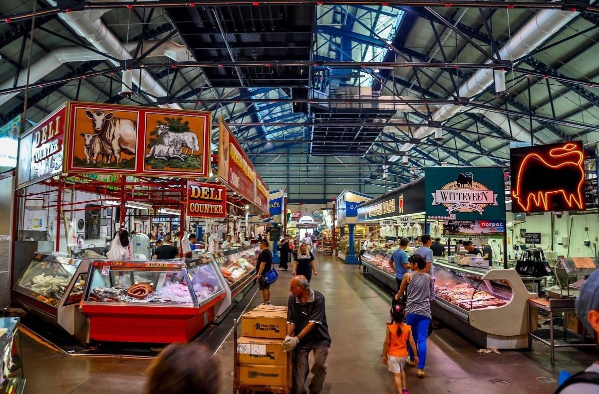 People in St. Lawrence market, one of the top Toronto sights