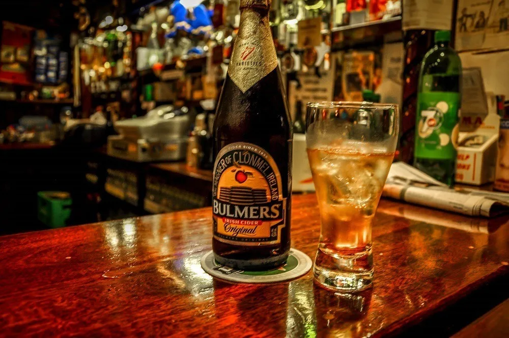 Bulmers bottle and glass on the bar