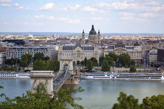 Overhead view of the chain bridge, castle, and Danube River in Budapest