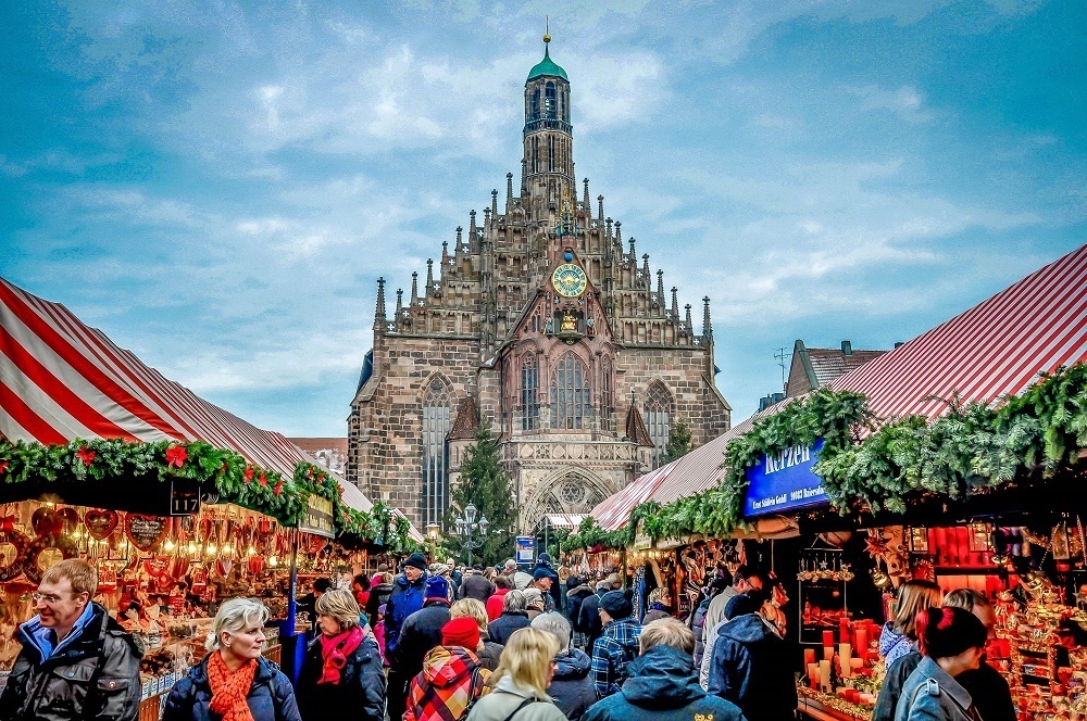 Shoppers fill the aisles of the Nuremberg Christmas market