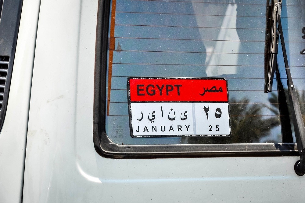 "January 25" bumper sticker on van