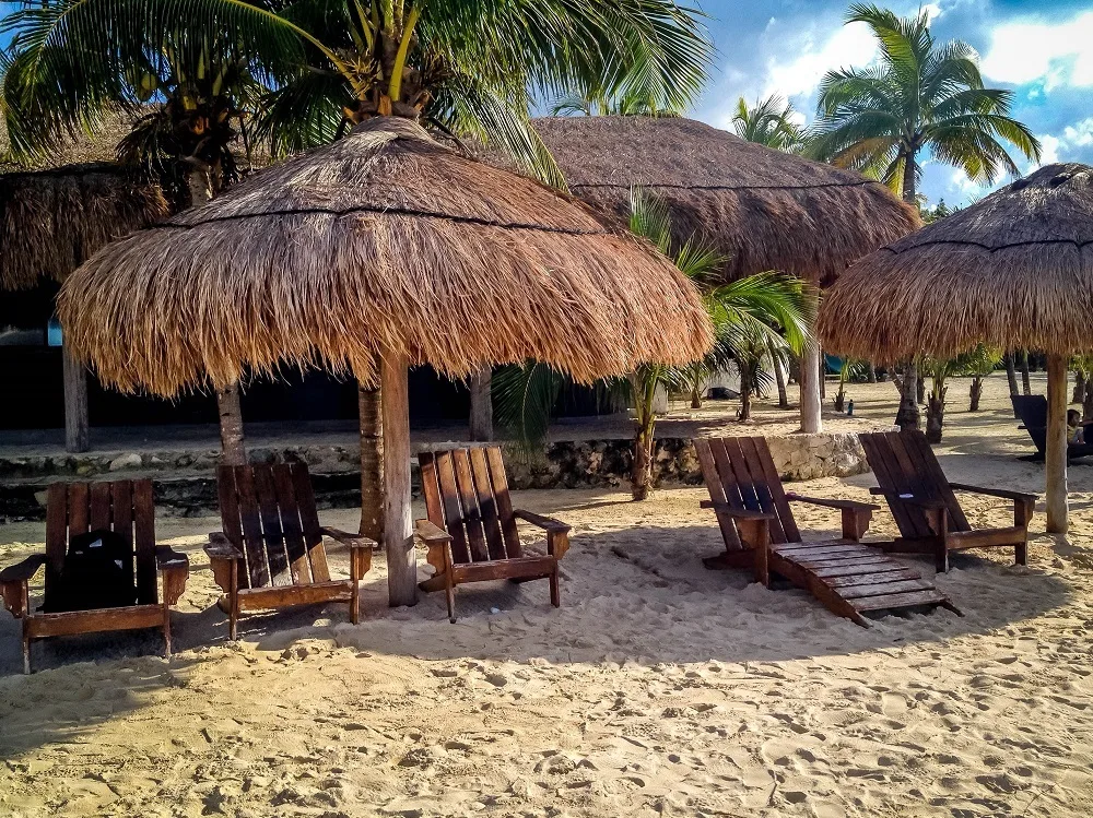 Snapshot of Cozumel Chankanaab National Park:  The quiet chairs on the beach.  You can find peace and quiet here if you just look for it.  Chankanaab Park Cozumel can be relaxing or it can be an adrenaline thrill if you decide to go on the zipline in Cozumel.