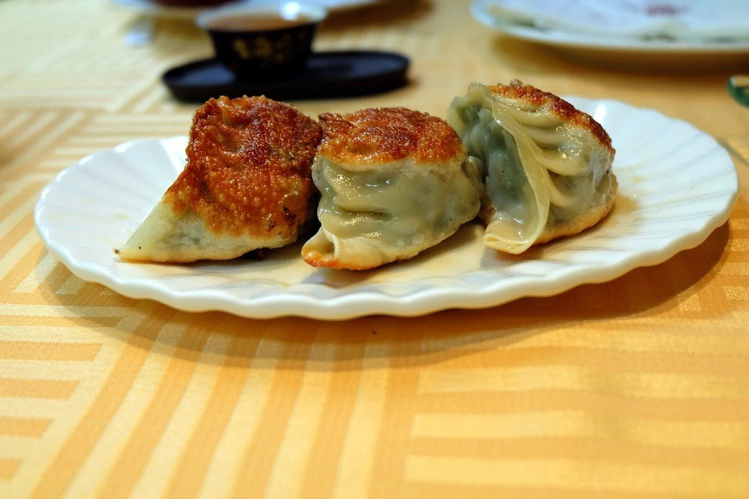 Jiaozi, known as pot stickers, in China.  Learning to cook Chinese dishes is part of Dongguan expat life.