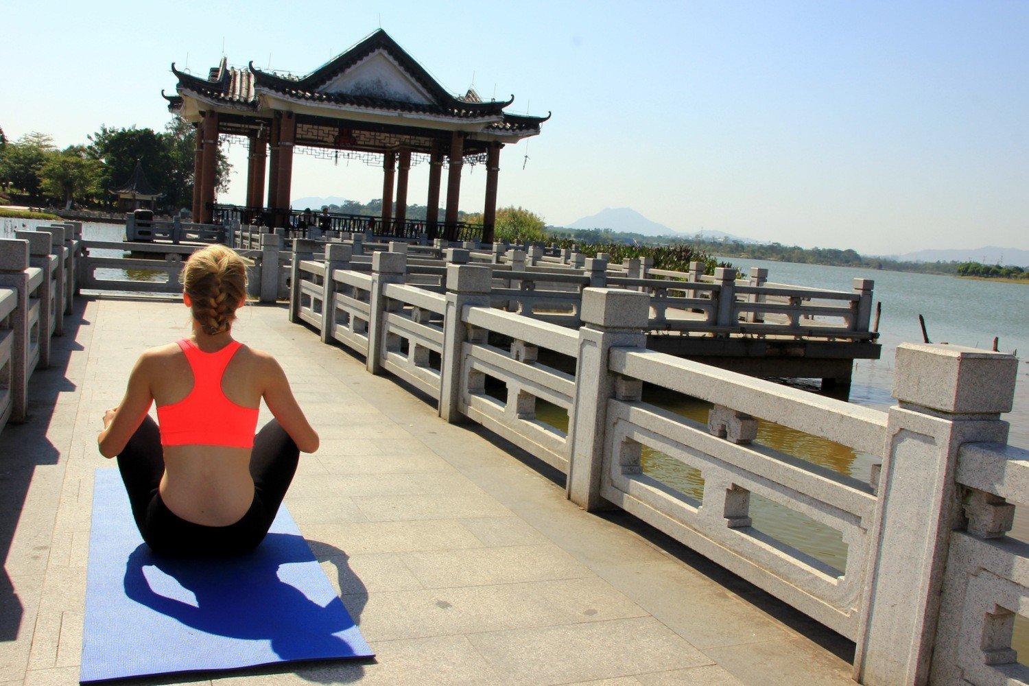 Agness Walewinder of eTramping practicing yoga at Songshan Lake, part of her Dongguan expat life.