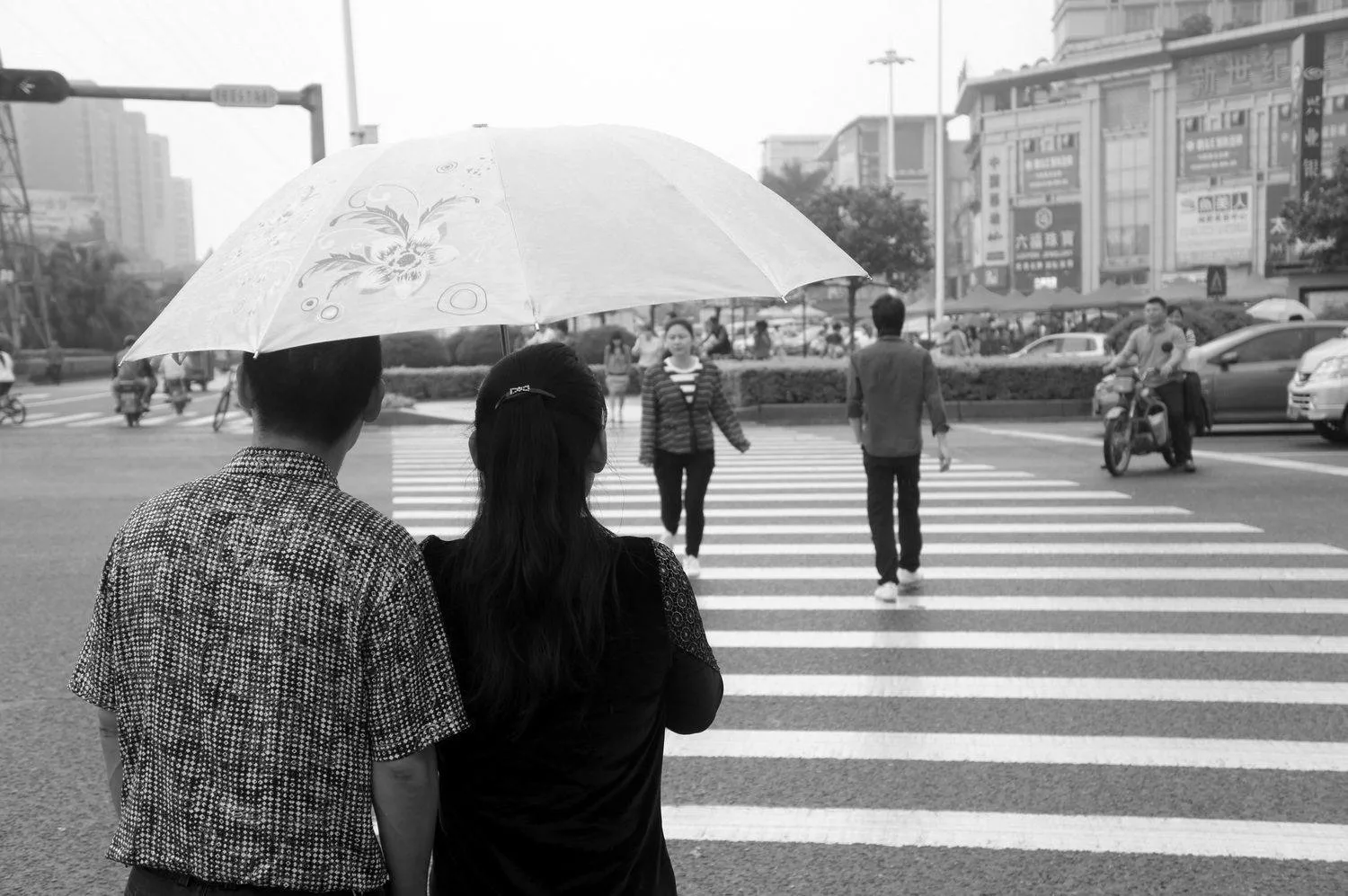 Lovers out for a stroll in Dongguan, the "Sex Capital of China" (this is China's "sin city")