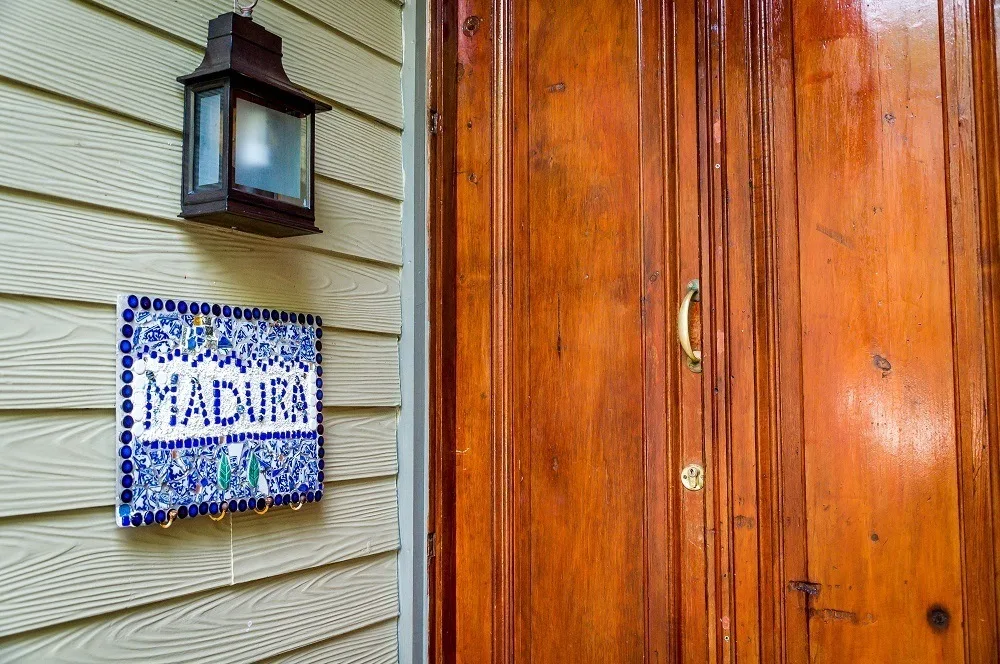 Sign and front door of the Madura suite