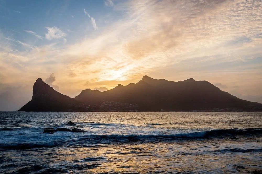 Sunset over Sentinel Peak and Hout Bay from The Tintswalo Atlantic Cape Town lodge