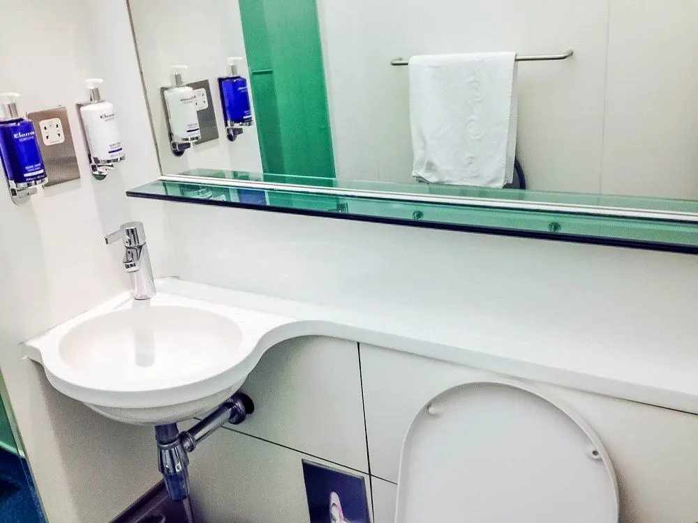 The private showers in the  British Airways lounge at Heathrow Terminal 5. Showers in the BA lounges Heathrow Terminal 5 are private and free for club members or first-class travelers, as well as OneWorld Priority members.