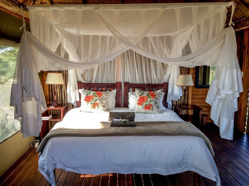The bedroom in our chalet with mosquito netting at nThambo Tree Camp