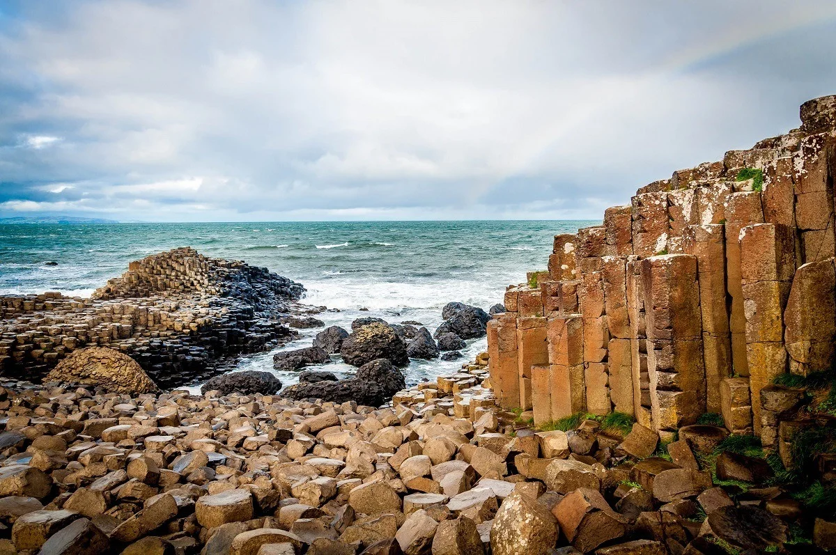 A rainbow over the iconic basalt columns of The Giant's Causeway