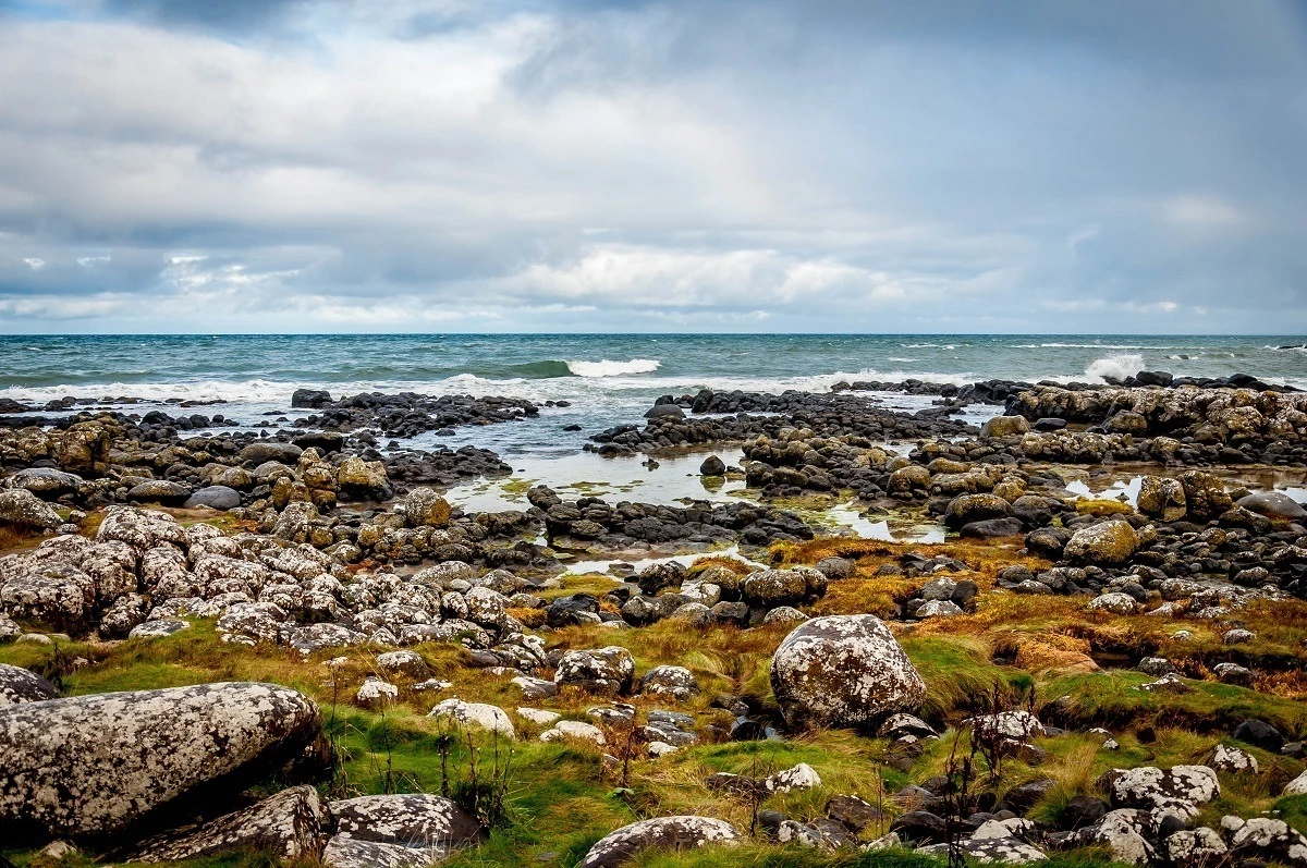 The Causeway Coastal Route explores the rough (but beautiful) Antrim Coast