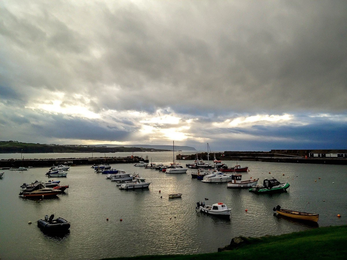Boats in the harbor at the village of Portrush on the Antrim Coast