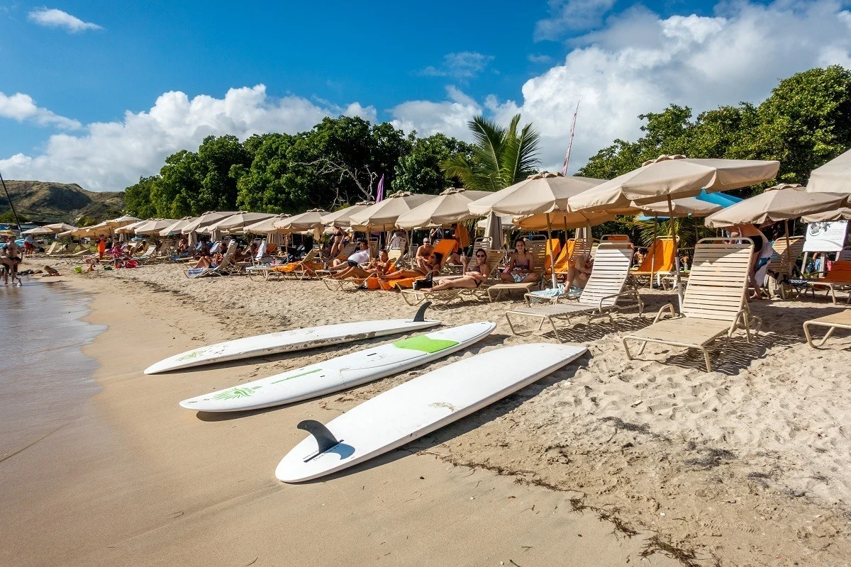 Paddle boards, sun loungers and sun umbrellas at Cockleshell Beach