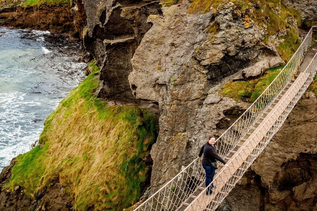 Laura venturing out on the Antrim Coast Road's Carrick-a-Rede rope bridge