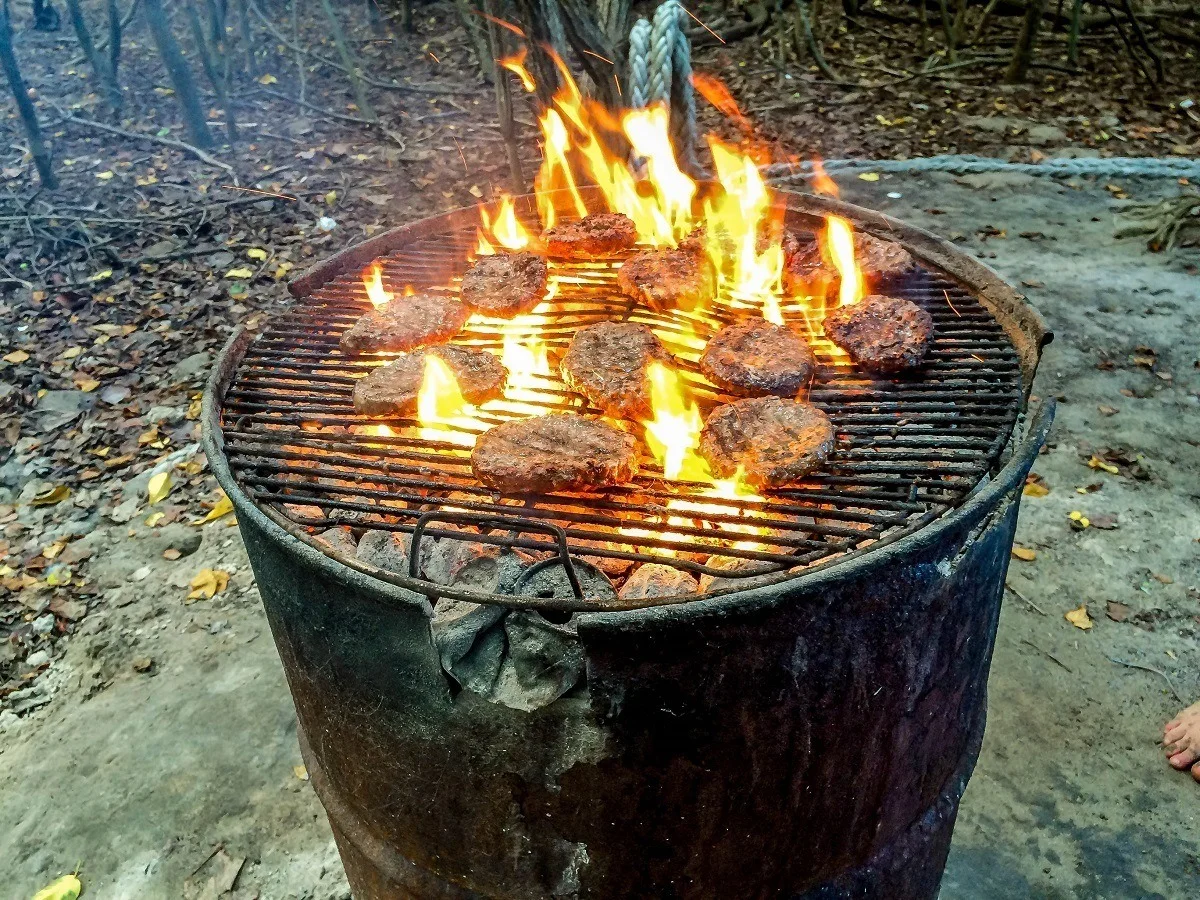 Hamburgers on a charcoal grill