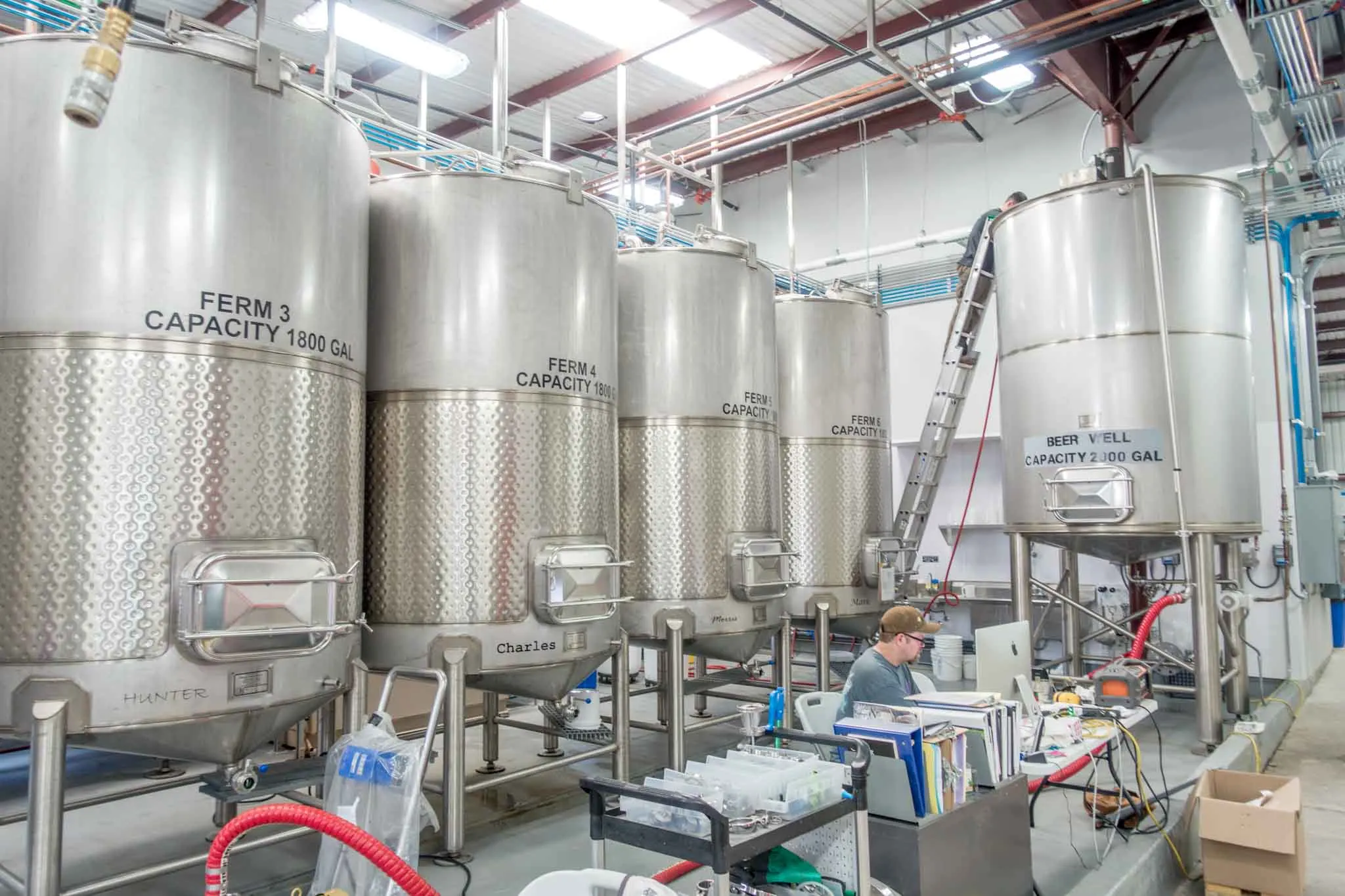 Steel fermentation tanks at a distillery