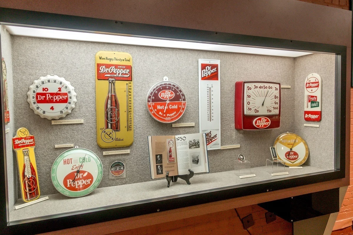 Dr Pepper clocks and thermometers on display