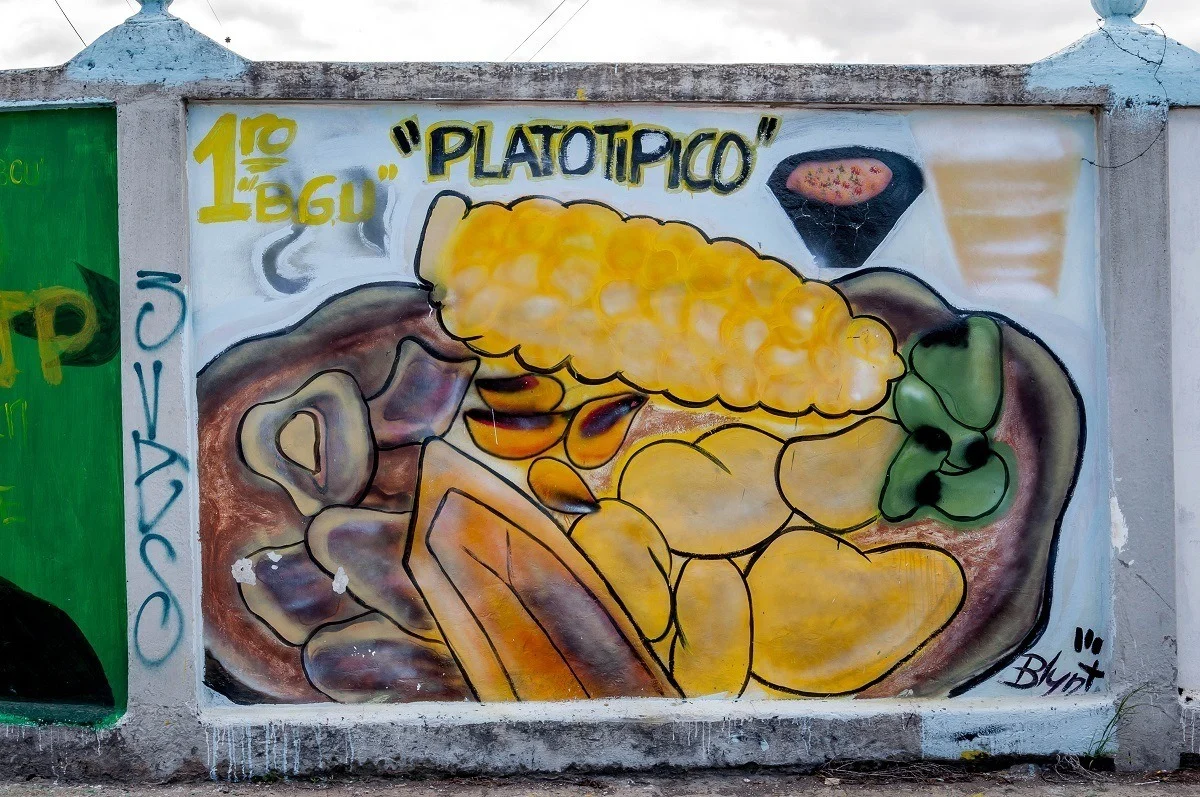Traditional foods featured in this graffiti mural in Machachi