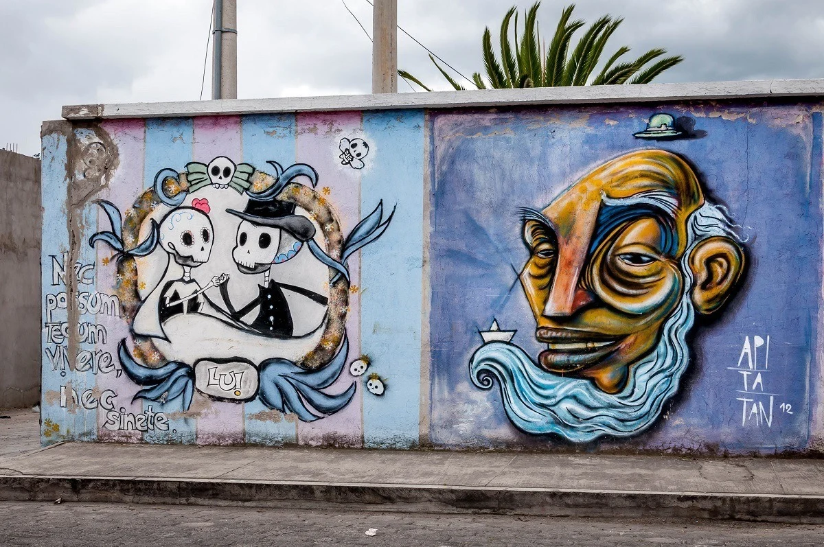 Murals in Otavalo of old man and dancing skeletons