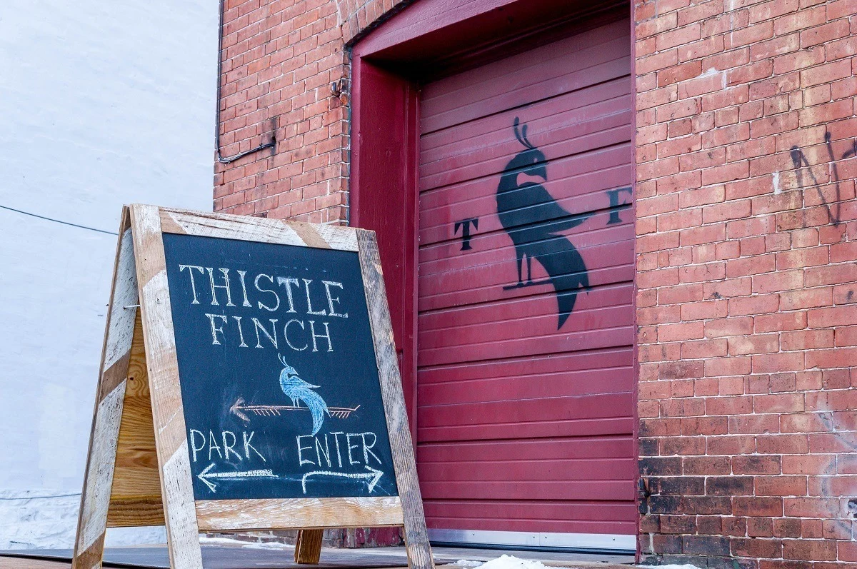 The sign for Thistle Finch Distillery in Lancaster, Pennsylvania.