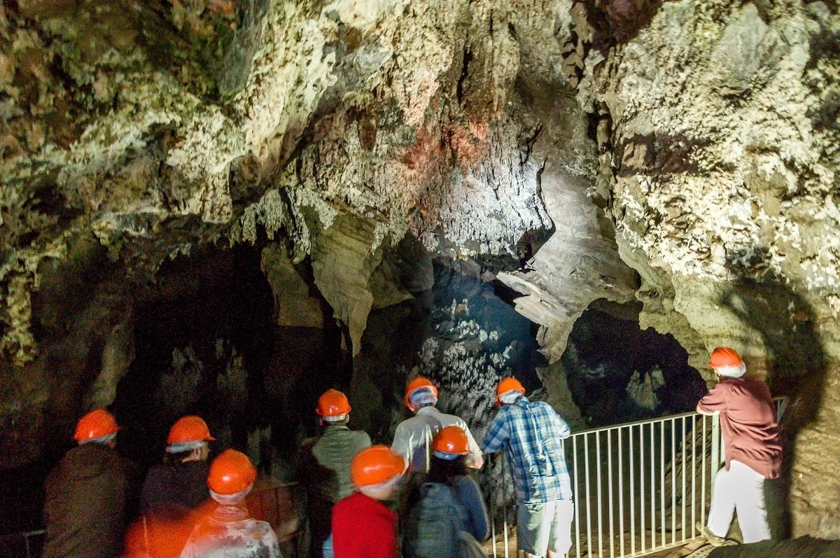 A group of visitors exploring inside the Sterkfontein Cave