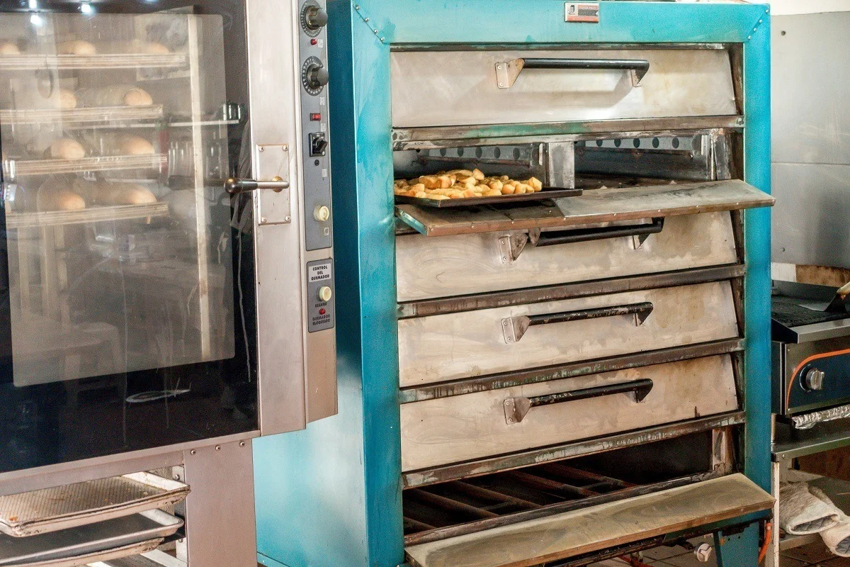 Bizcochos baking in a large commercial oven