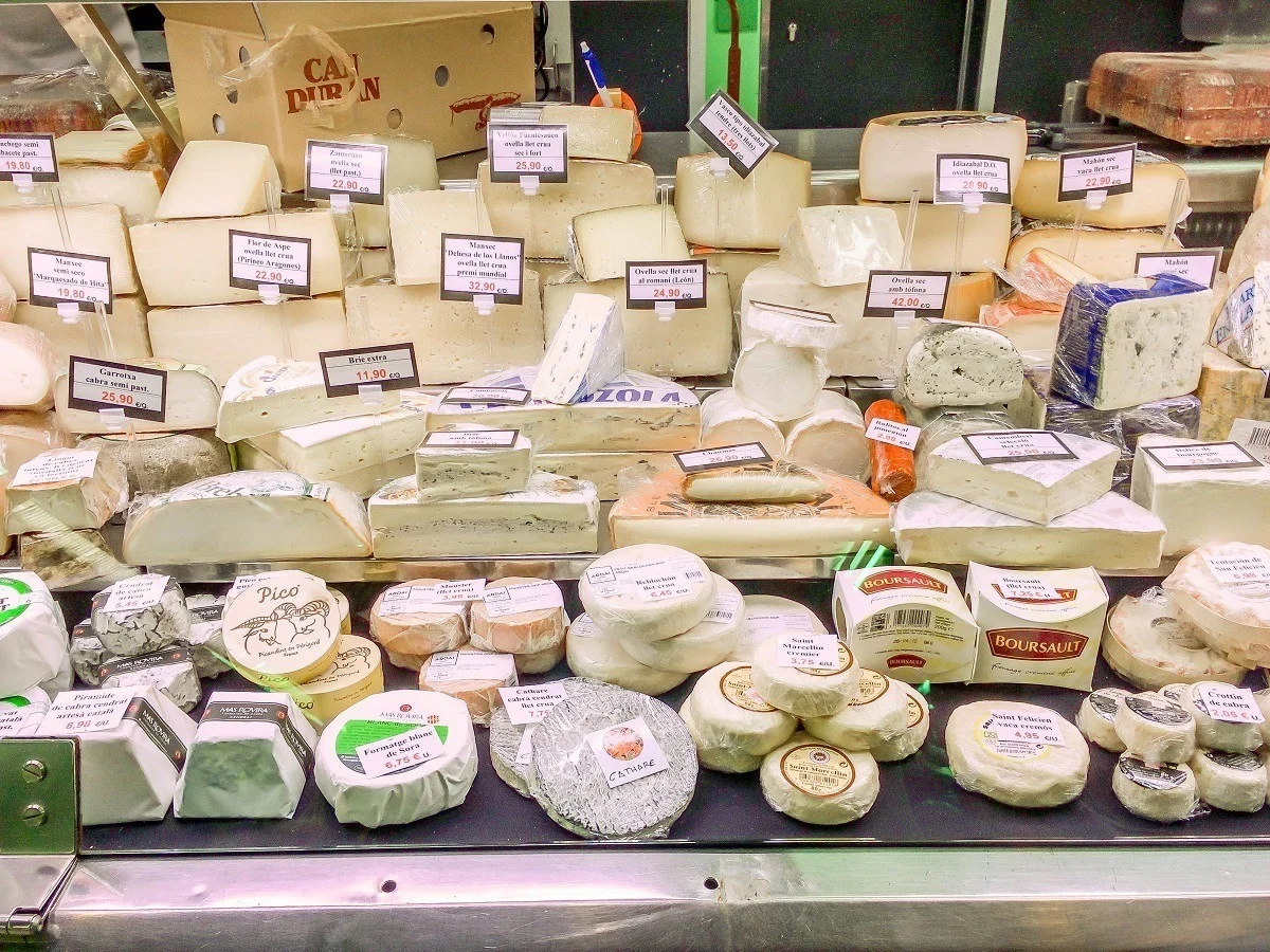 A wide variety of cheeses in the Mercat de l'Abaceria Central in Barcelona