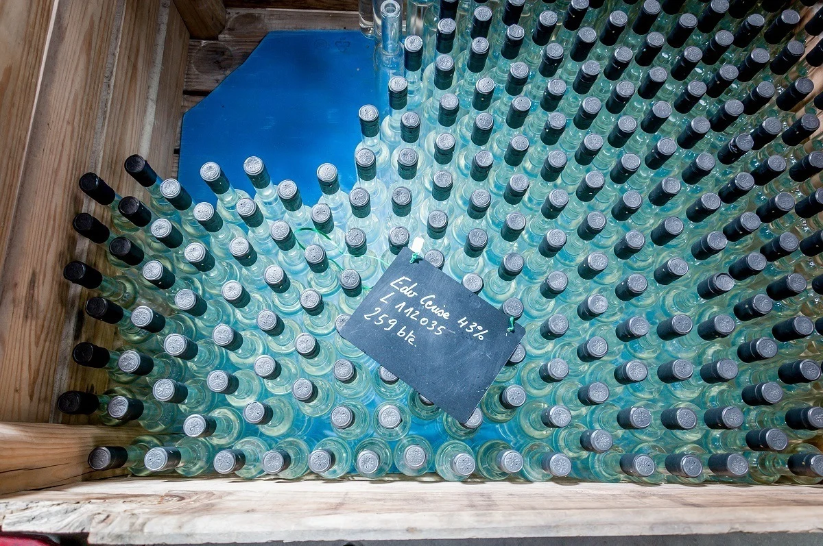 Crate of glass bottles for cherry brandy
