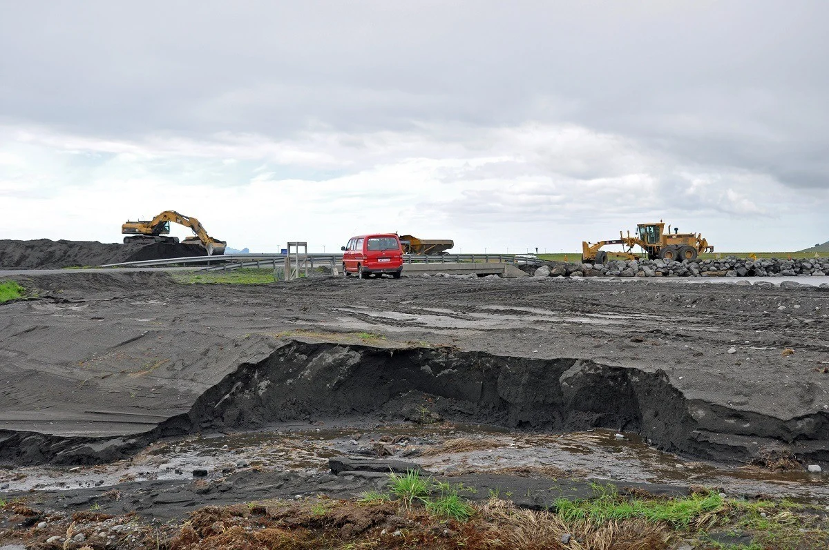 Earth movers removing volcanic ash from the Eyjafjallajokull eruption in Iceland