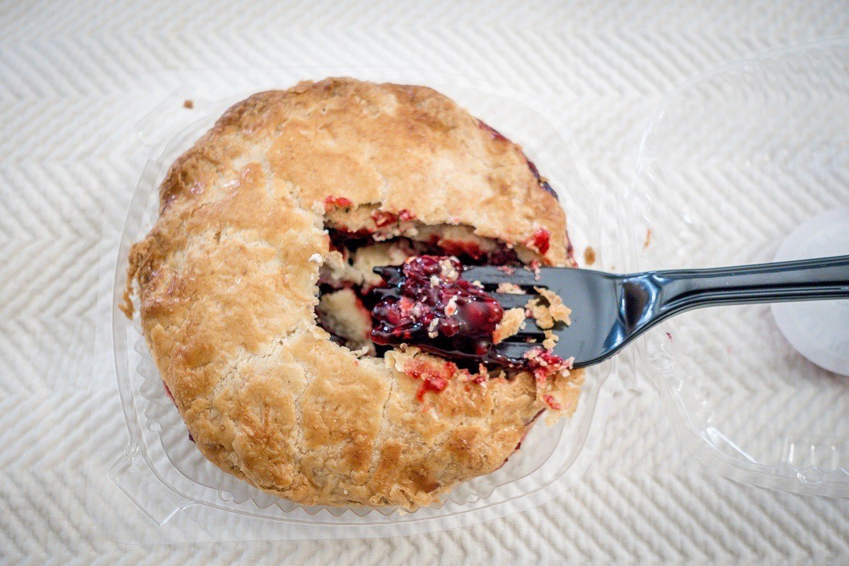 Red fruit pie with fork