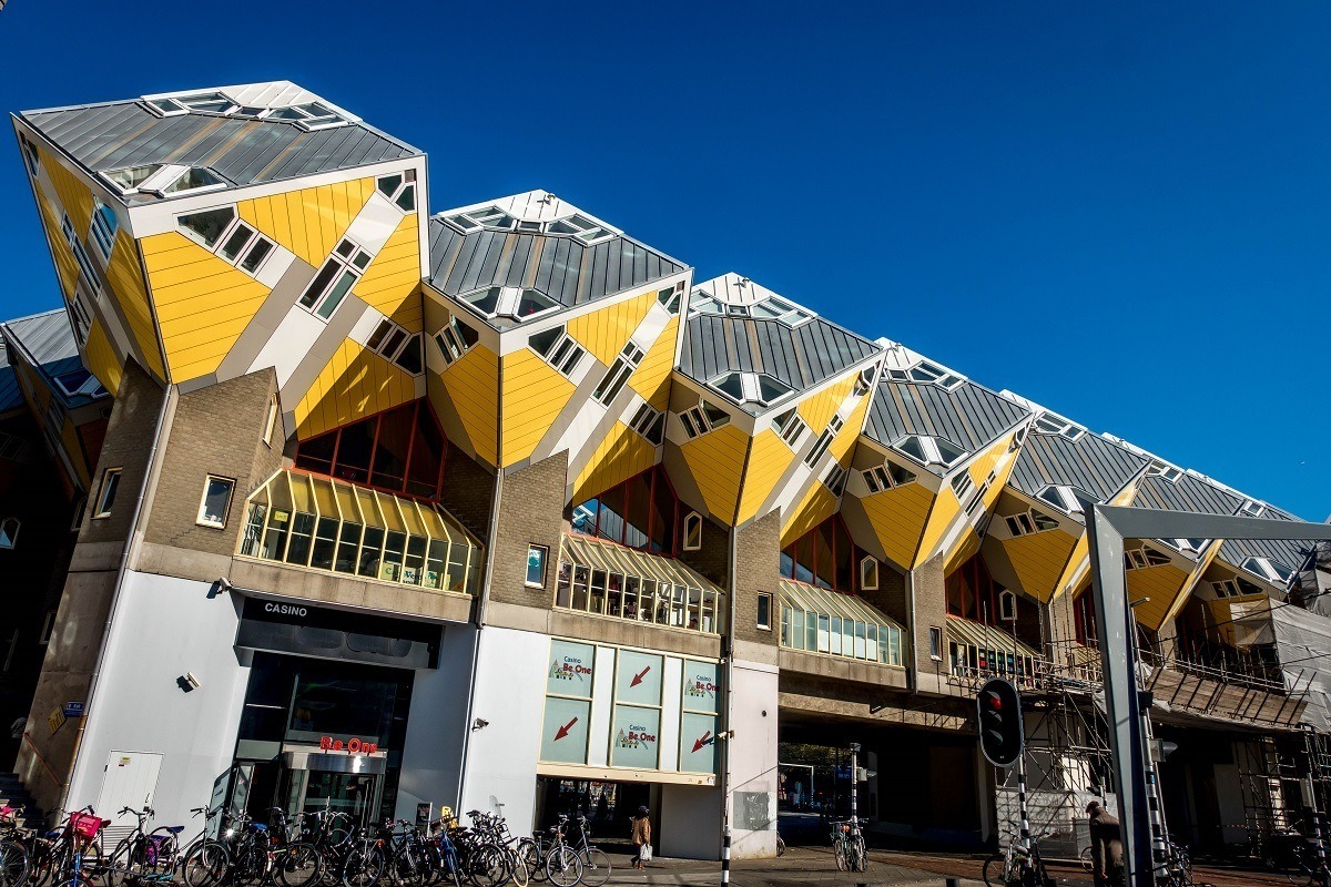Row of yellow Cube Houses built on a 55-degree angle, unique Rotterdam architecture