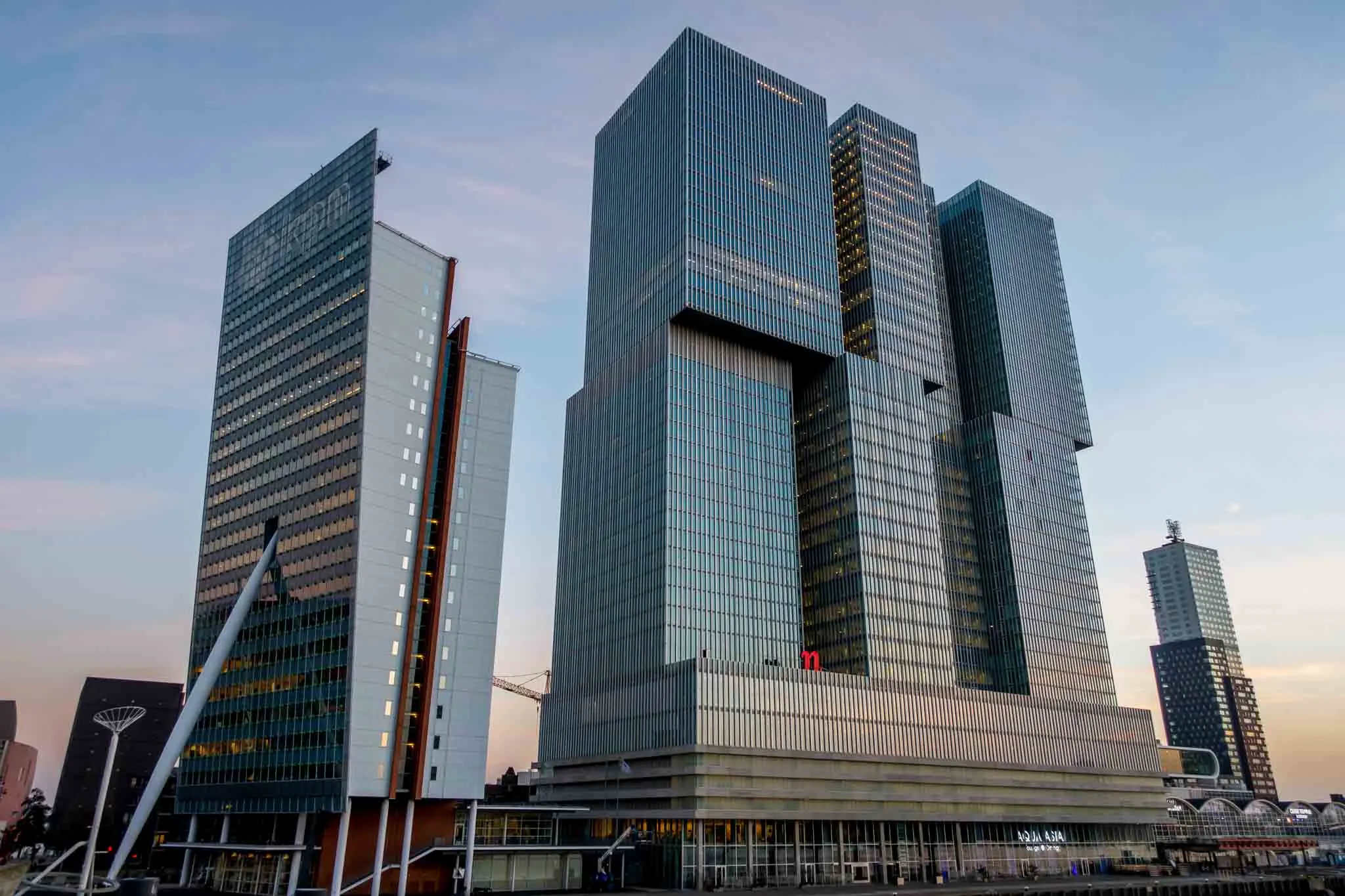 The tangled, gray towers of the De Rotterdam building in Rotterdam 