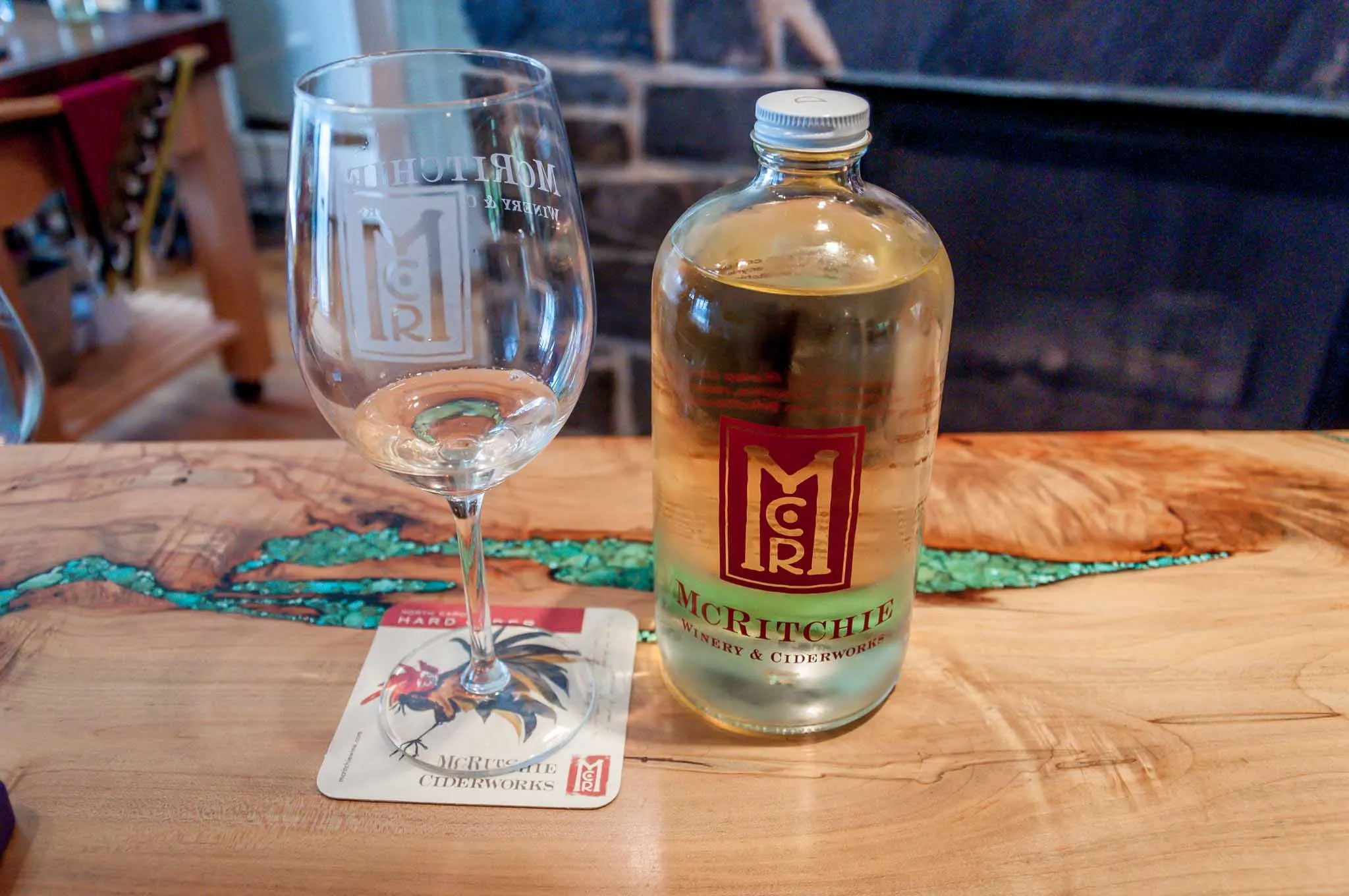 Bottle of cider and glass at McRitchie Vineyards and Ciderworks 