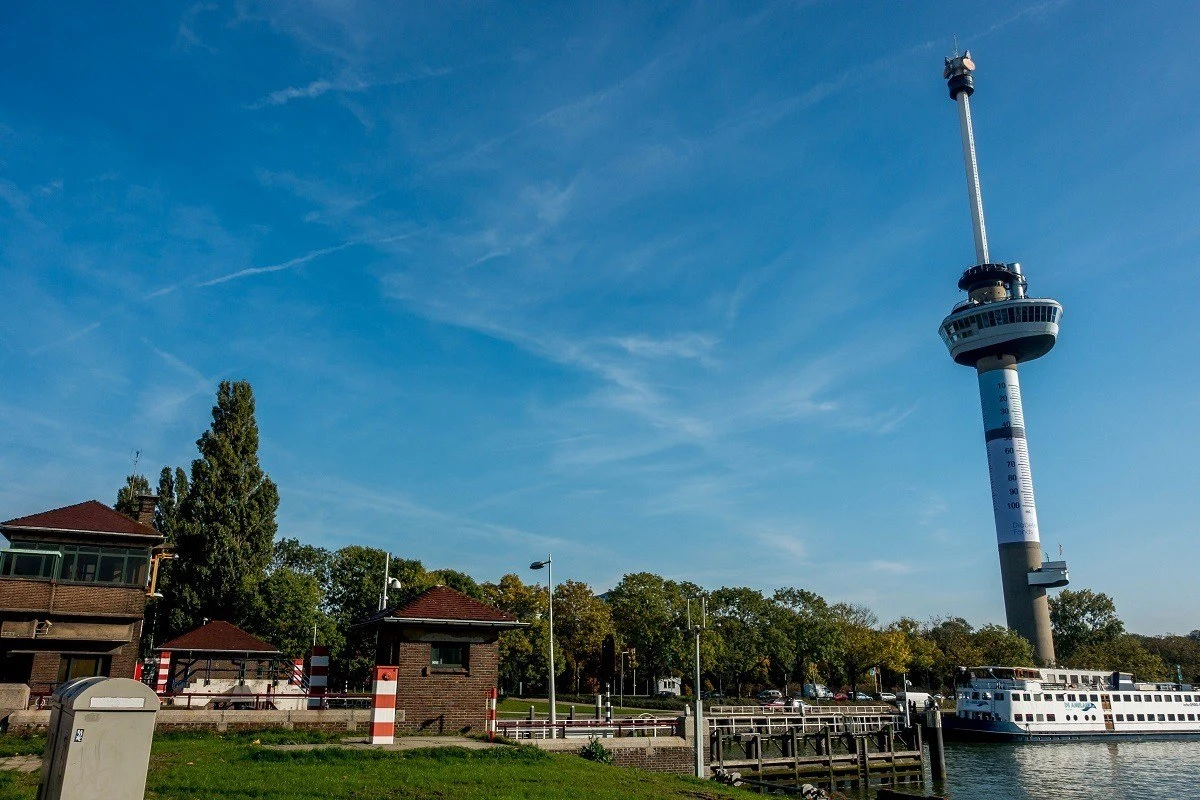 Large, thin Euromast tower with boat at its base