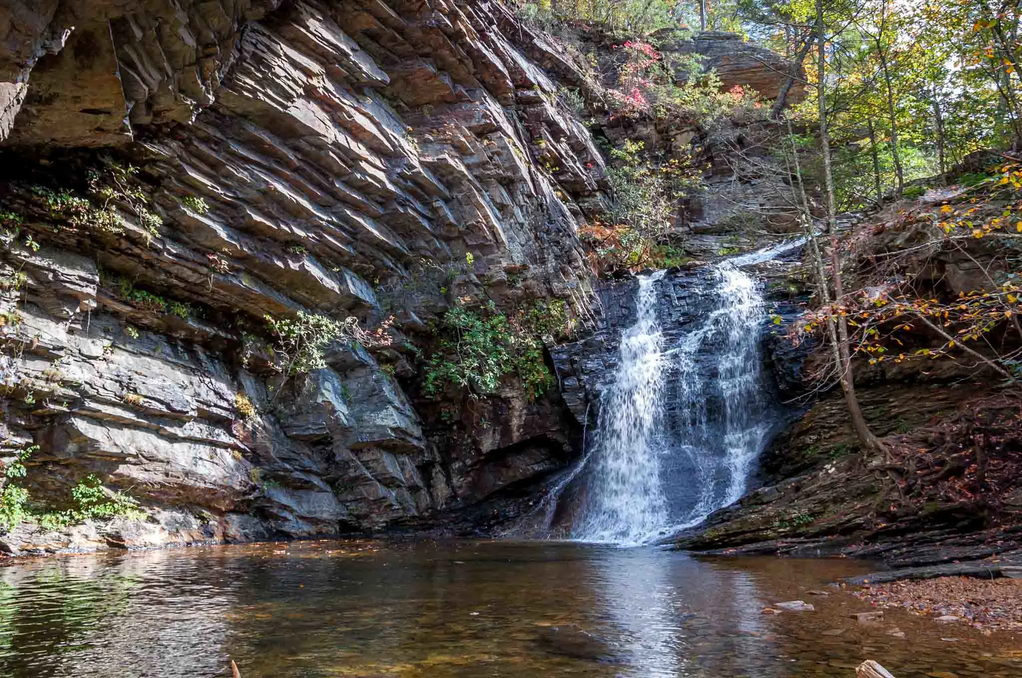 Waterfall surrounded by fall foliage in Hanging Rock State Park.
