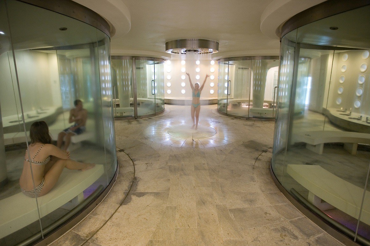 People in the glass aromatherapy steam rooms and cold shower
