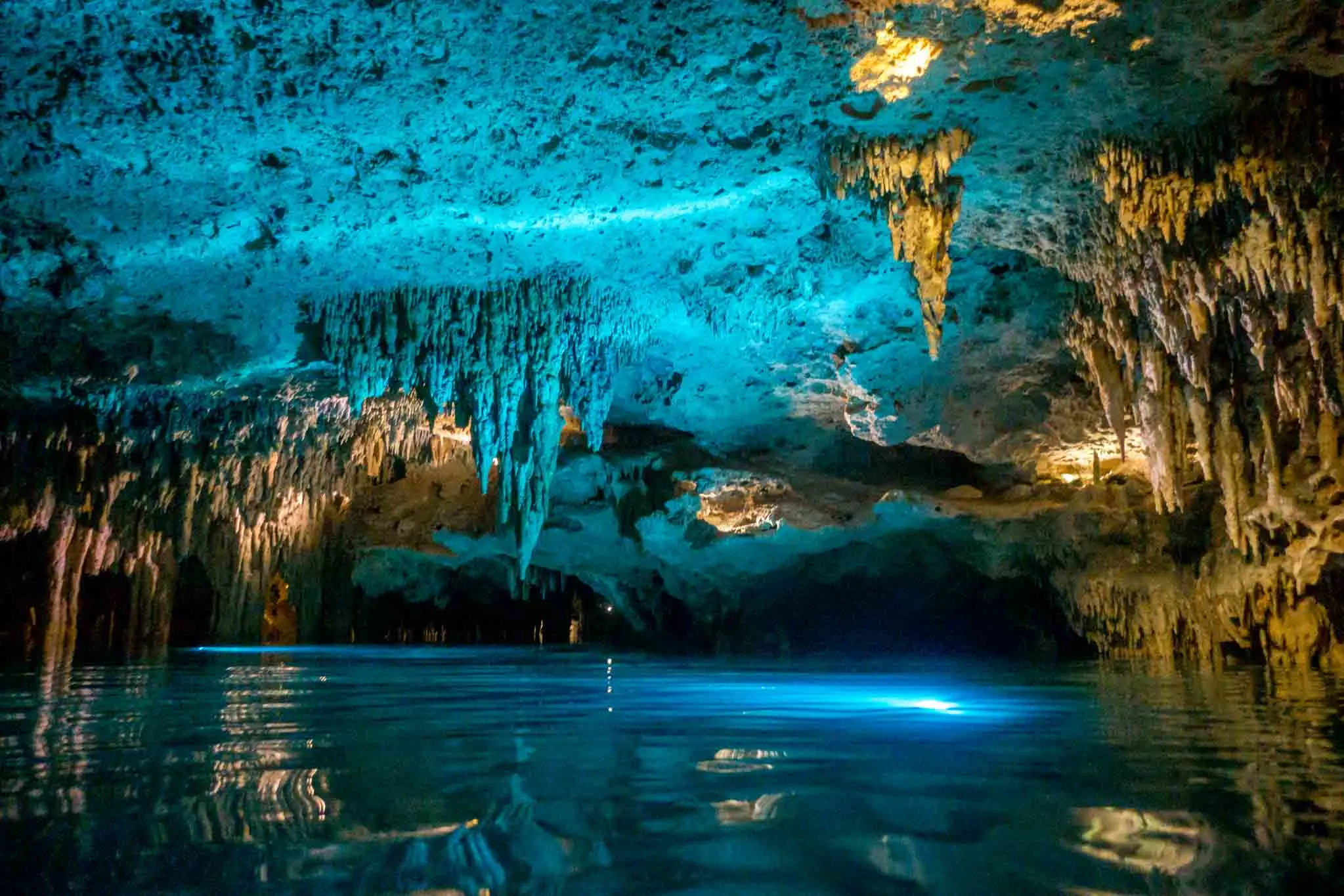 Underground river lit up with blue light